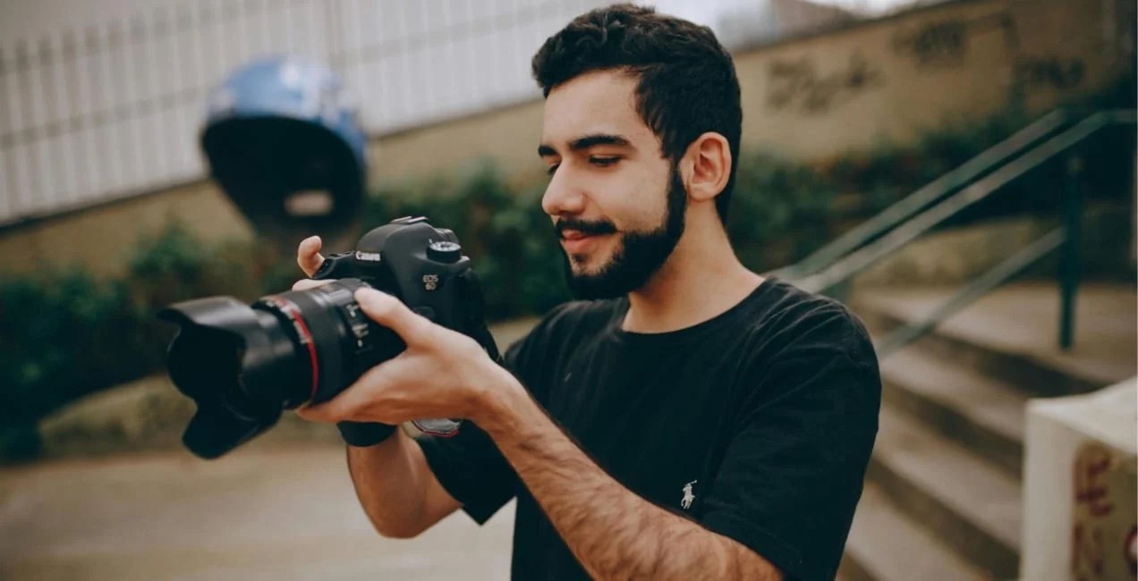 photographer working with his camera