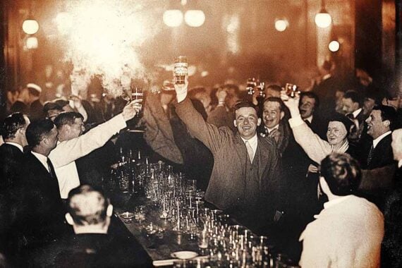 Image from the 1930s of folks celebrating in a bar