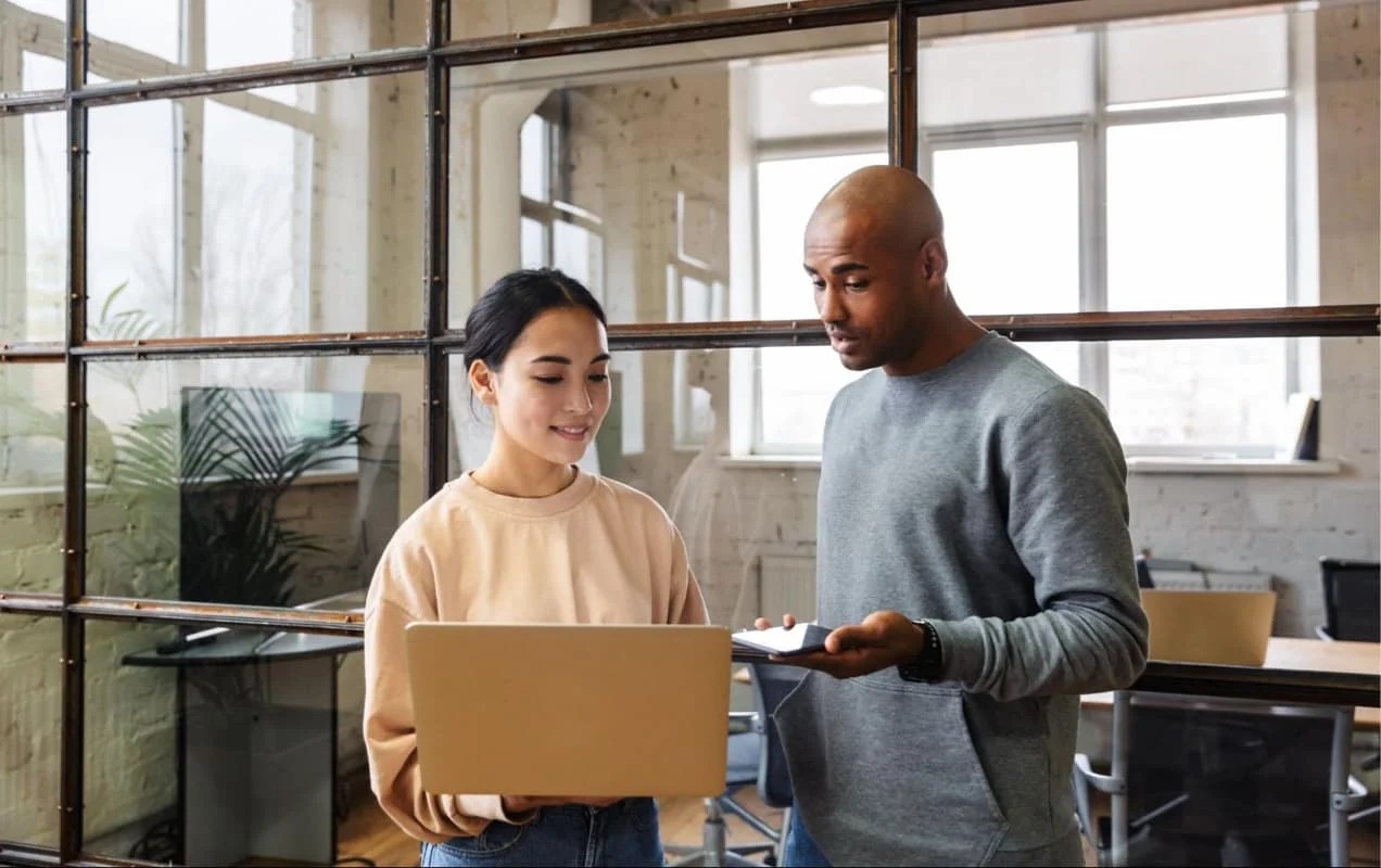 two people working in an office space