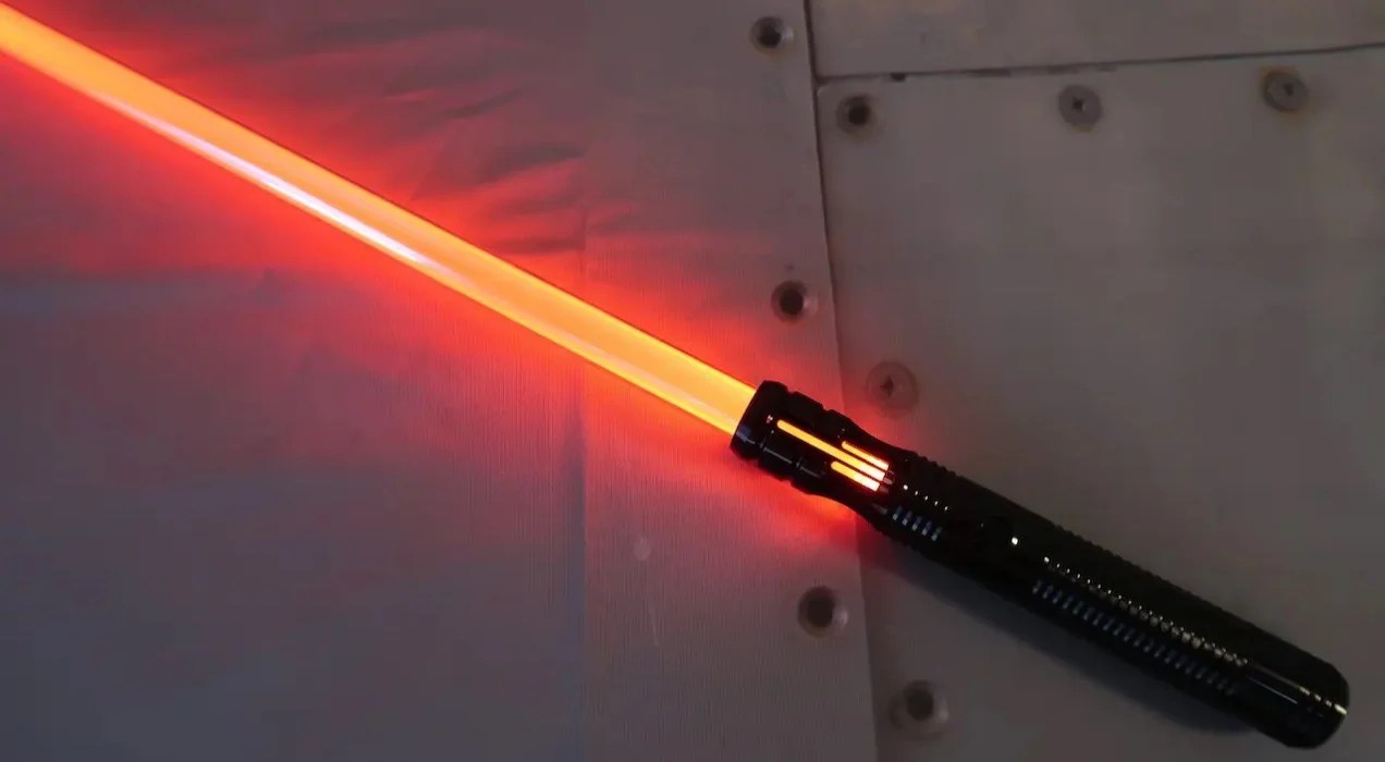 neat custom lightsaber, lit up