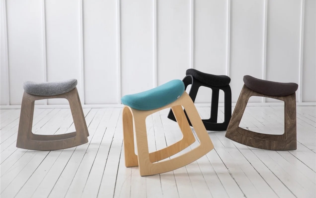 four Muista chairs, shown rocking in a room 