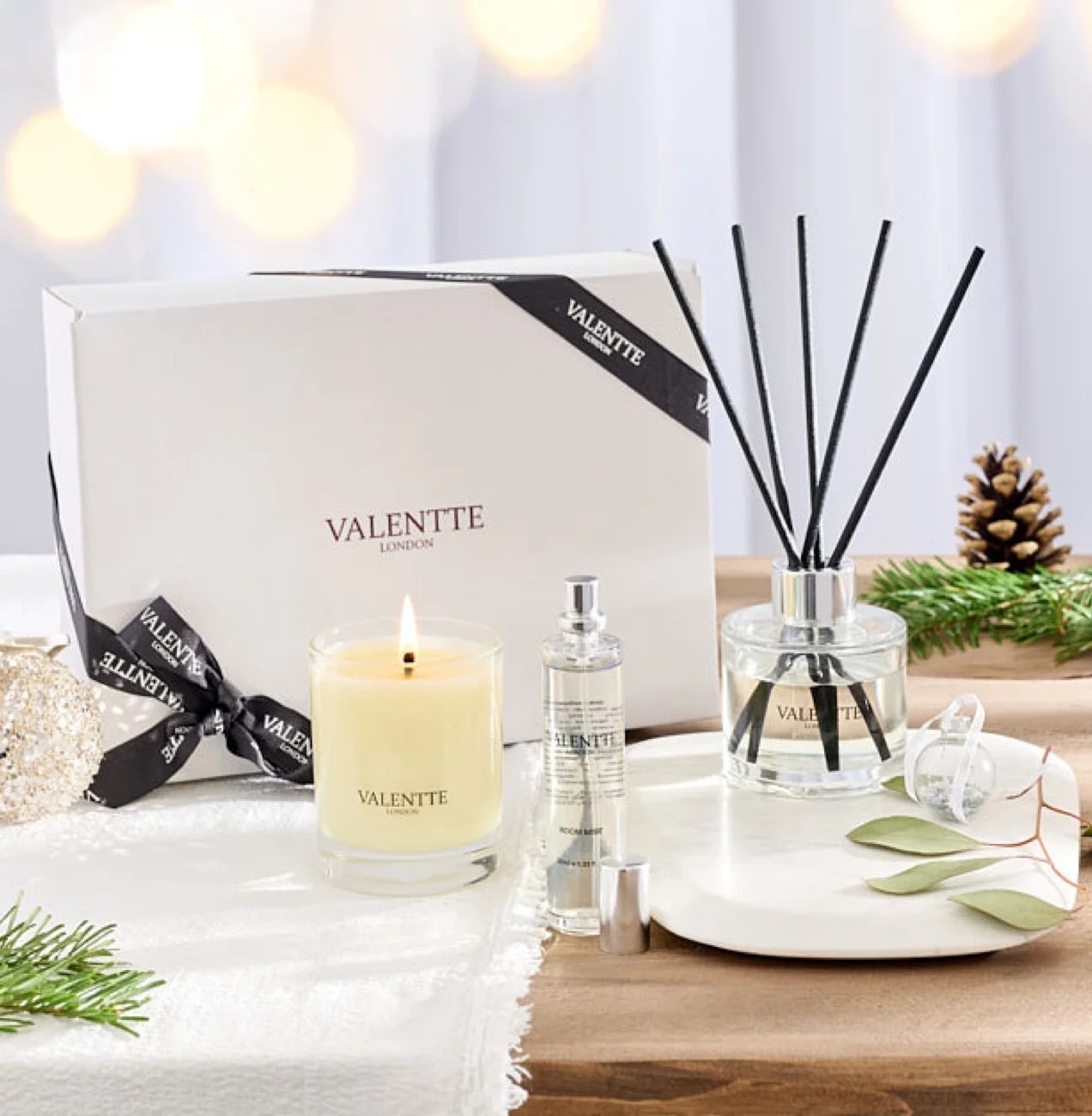 beautiful candle set on a table from Valentte