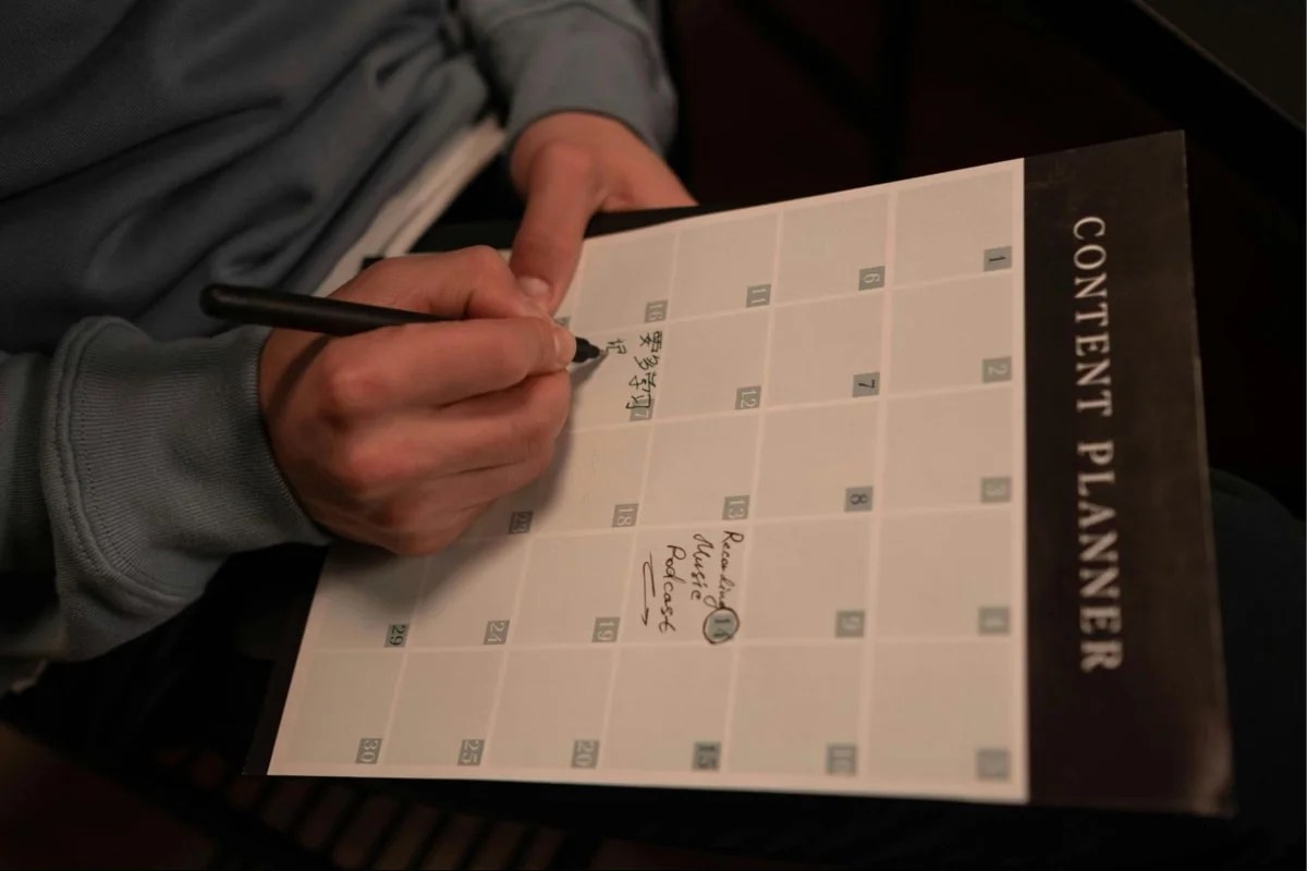 business owner mapping out content in a calendar