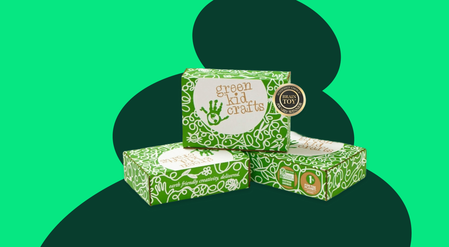 a photo of three green and white boxes on a dark green and light green background