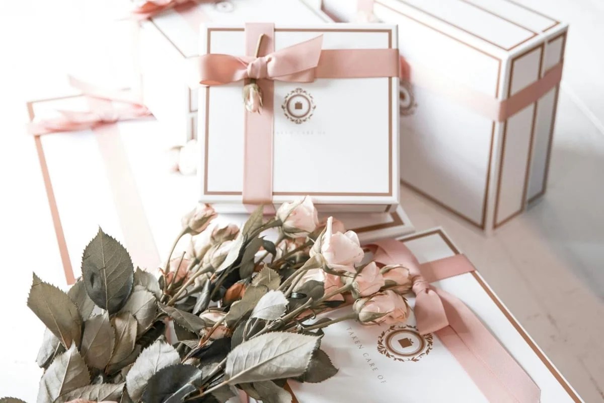 stack of gift boxes with roses