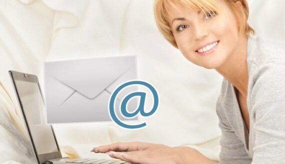 Female in front of a laptop engaging with email