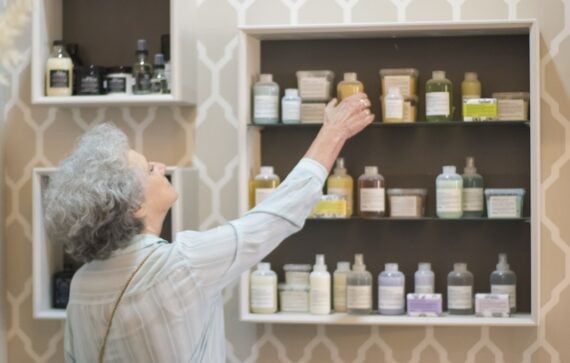 Female at a spa looking a beauty products to buy